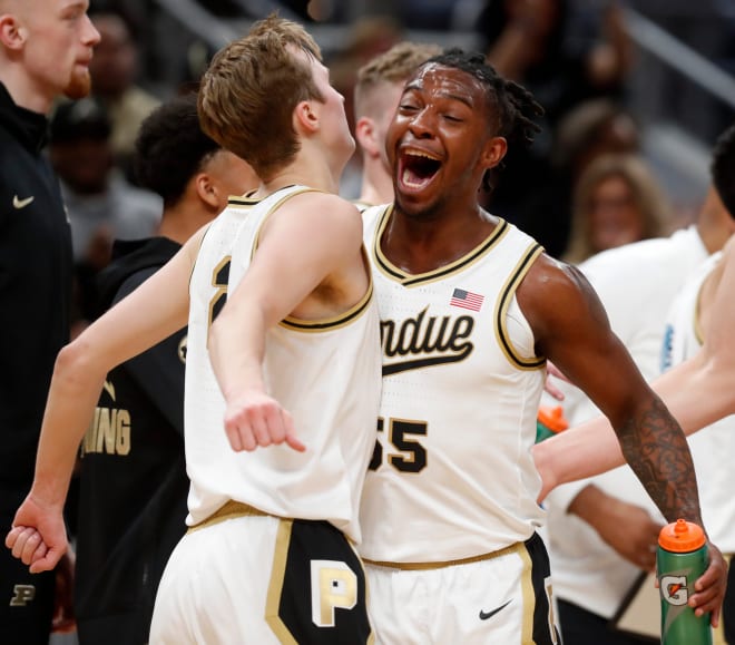 Purdue Boilermakers guard Fletcher Loyer (2) and Purdue Boilermakers guard Lance Jones (55) celebrate during a timeout during the NCAA men s basketball game against the Arizona Wildcats, Saturday, Dec. 16, 2023, at Gainbridge Fieldhouse in Indianapolis. Purdue Boilermakers won 92-84.