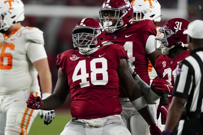Alabama Crimson Tide defensive lineman Phidarian Mathis (48) celebrates a sack against Tennessee. Photo | Getty Images 