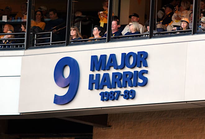 Harris' No. 9 hangs above one of the end zones at Milan Puskar Stadium.