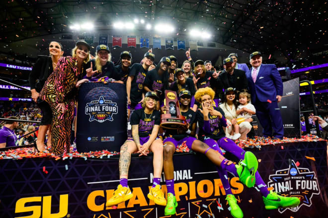 LSU players and coaches pose for one last team photo on April 2 in Dallas after beating Iowa in the national championship game