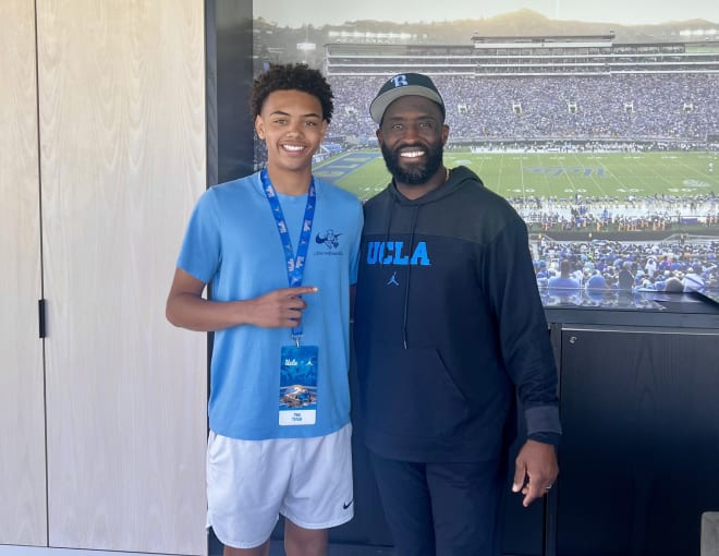 Trae Taylor, left, with UCLA head coach DeShaun Foster during his trip to Westwood.
