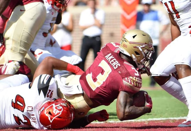 Cam Akers scores one of his three touchdowns for Florida State on Saturday.