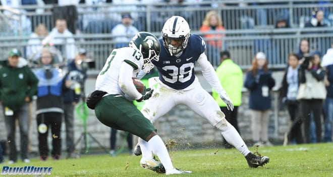 Wade makes a tackle in the game against Michigan State back in October. 