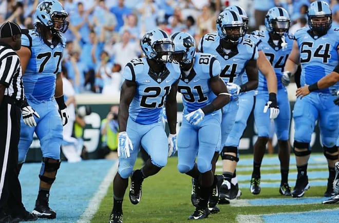 Dancy (right, 54) started in two wins for the UNC, including this one versus Liberty.