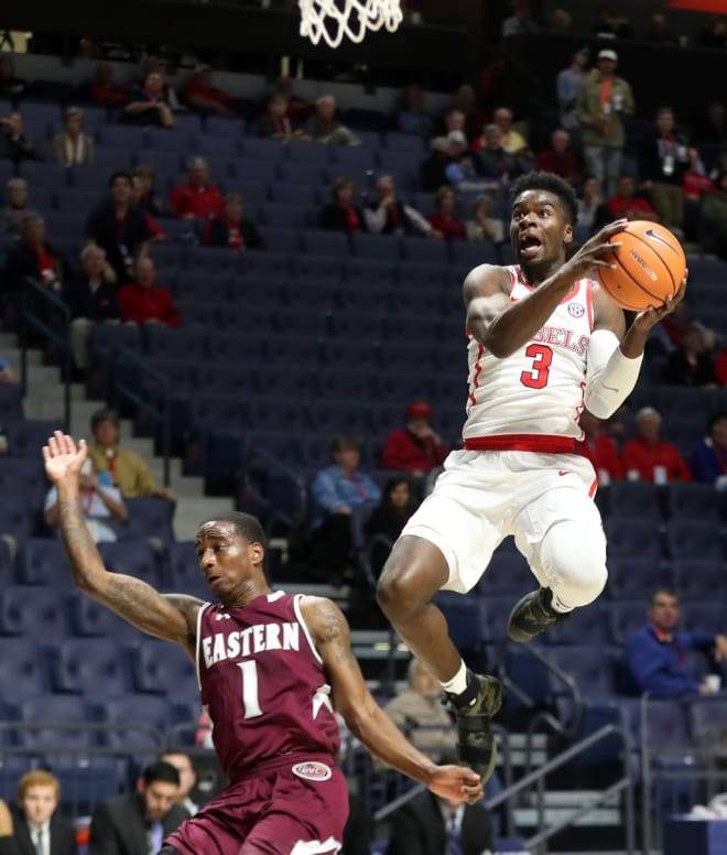 Ole Miss guard Terence Davis drives to the basket over Eastern Kentucky's JacQuess Hobbs during the Rebels' win Monday night at The Pavilion at Ole Miss. 
