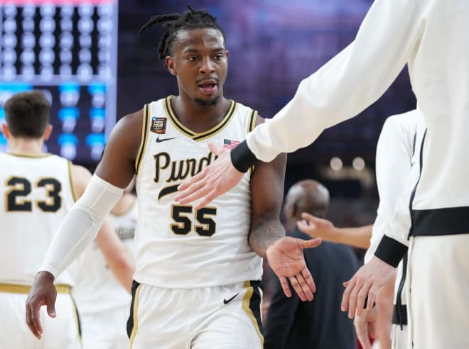 Purdue Boilermakers guard Lance Jones (55) celebrates with teammates during the NCAA Menâ€™s Basketball Tournament Final Four game against the North Carolina State Wolfpack, Saturday, April 6, 2024, at State Farm Stadium in Glendale, Ariz.