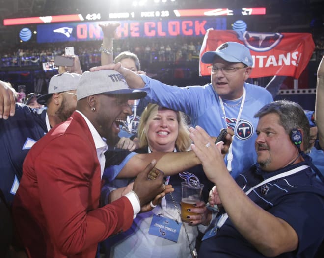 Rashaan Evans (Alabama) celebrates with fans after being selected as the number twenty-two overall pick to the Tennessee Titans in the first round of the 2018 NFL Draft at AT&T Stadium. Photo | USA Today