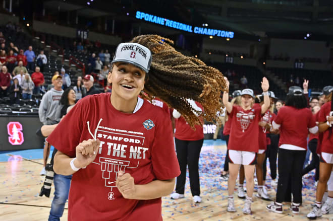 Haley Jones celebrates after Stanford wins the Spokane Regional. 