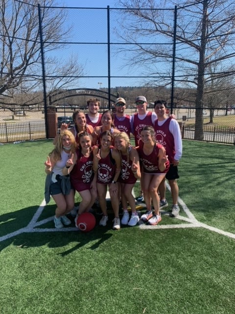 My daughter, Campbell (middle row, second from left) and her kickball team celebrate a tournament title Saturday in Fayetteville, Ark.