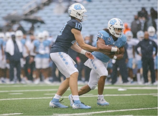 UNC's running backs keep hearing about what the program lost from last fall, fueling their preparation for this season.