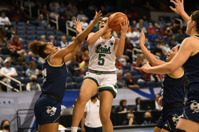 Notre Dame guard Olivia Miles (5) shoots a runner against Georgia Tech's Eylia Love (24) during ND's ACC Tourney quarterfinal win Friday night at Greensboro (N.C.) Coliseum.