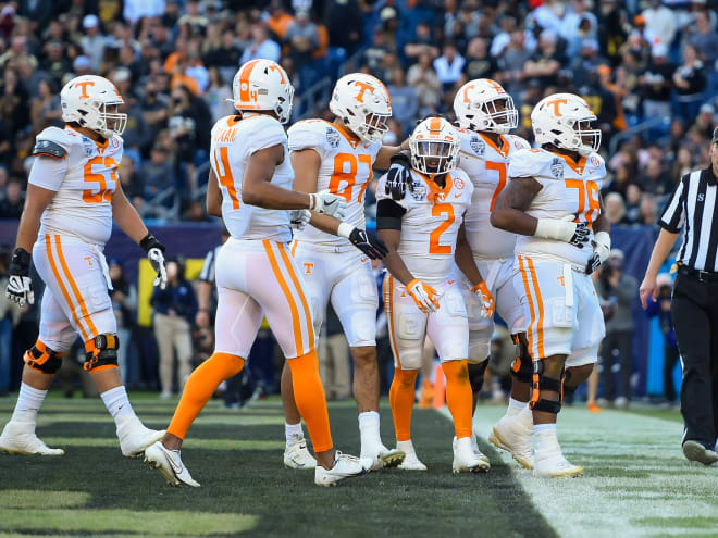 Dec 30, 2021; Nashville, TN, USA; Tennessee Volunteers running back Jabari Small (2) celebrates the score with his teammates against the Purdue Boilermakers during the first half at Nissan Stadium.