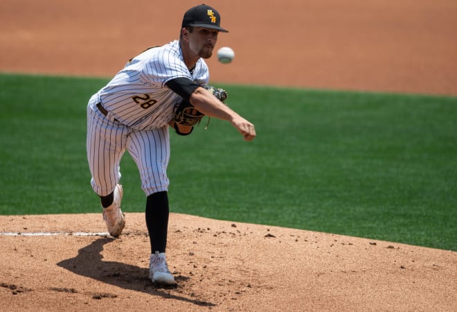 Southern Miss Golden Eagles Tanner Hall (28) pitches as Southern Miss Golden Eagles takes on Samford Bulldogs during the NCAA baseball championship regional at Plainsman Park in Auburn, Ala., on Friday, June 2, 2023.