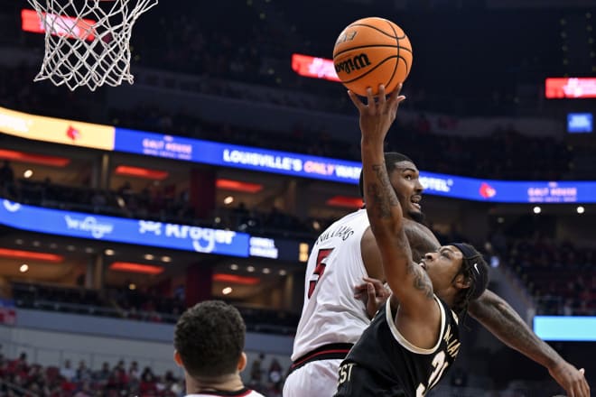 Wake Forest's Alondes Williams, here going up against Louisville's Malik Williams, has been the Deacons' best player this season. 