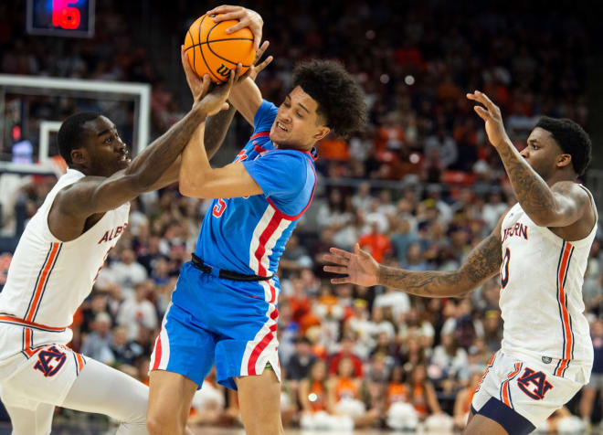 Ole Miss Rebels guard James White (5) is fouled by Auburn Tigers forward Jaylin Williams (2) at Auburn Arena in Auburn, Ala., on Wednesday, Feb. 23, 2022. Auburn Tigers defeated Mississippi Rebels ... Jake Crandall-USA TODAY NETWORK