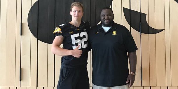 Class of 2019 defensive end Spencer Bono with Iowa recruiting coordinator Kelvin Bell.