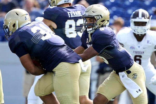 Malcolm Perry (right), who can also play in the slot, is one of two returning Navy quarterbacks who rushed for more than 1,000 yards in 2017. 