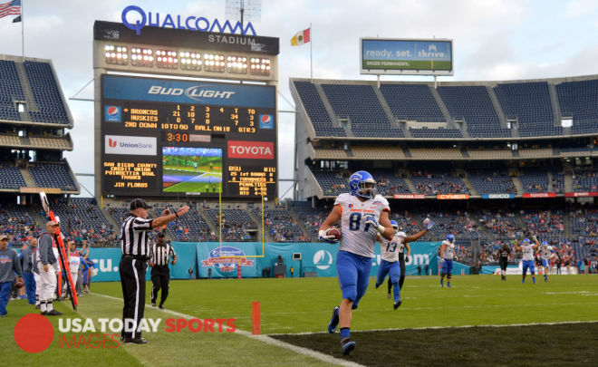 Boise State Broncos tight end Alec Dhaenens (87) scores on an 18-yard touchdown reception against   the Northern Illinois Huskies in the 2015 Poinsettia Bowl at Qualcomm Stadium.
