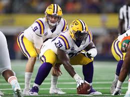 LSU center Lloyd Cushenberry, the 2019 co-winner of the Tigers' coveted No. 18 jersey, was almost a recruiting afterthought.