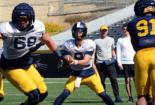 The West Virginia Mountaineers football team plans to hold a competition at quarterback in fall camp.