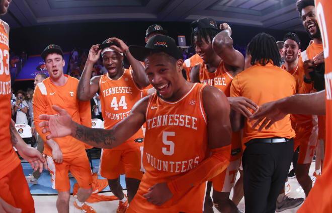 Nov 25, 2022; Paradise Island, BAHAMAS; Tennessee Volunteers guard Zakai Zeigler (5) dances with teammates after the game against the Kansas Jayhawks at Imperial Arena.