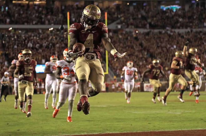 Dalvin Cook, who rushed for 169 yards, celebrates one of his four touchdowns on the night.