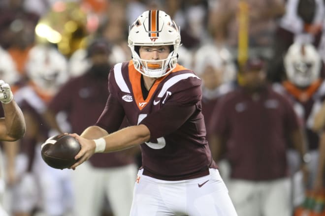 Sep 2, 2023; Blacksburg, Virginia, USA; Virginia Tech Hokies quarterback Grant Wells (6) hands off ball in the second quarter against the Old Dominion Monarchs at Lane Stadium. Mandatory Credit: Lee Luther Jr.-USA TODAY Sports