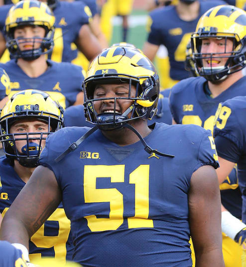 Michigan Wolverines football center Cesar Ruiz says the offensive line is working toward perfection.
