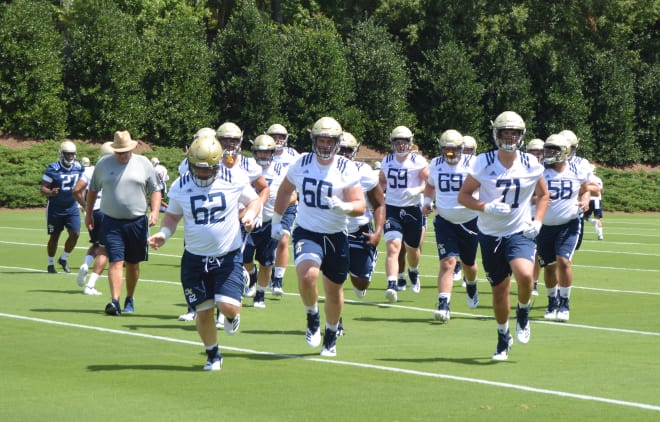 The massive group of offensive linemen in camp