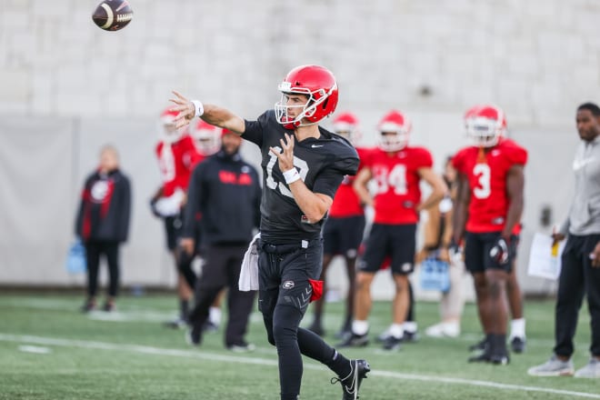 Stetson Bennett throws the ball at practice Monday. (Mackenzie Miles/UGA Sports Communications)