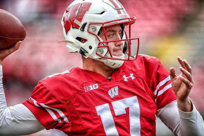 Jack Coan led Wisconsin to the Rose Bowl last season. 