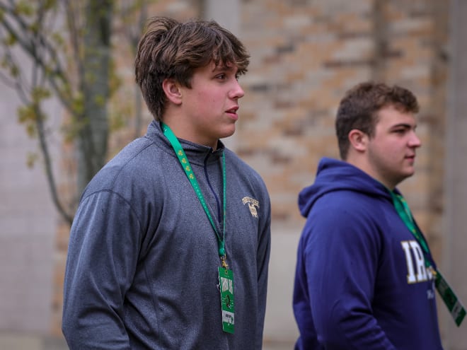Three-star offensive tackle Anthonie Knapp, left, committed to Notre Dame in March 2023. Now he's finding his way as a freshman with the Irish.