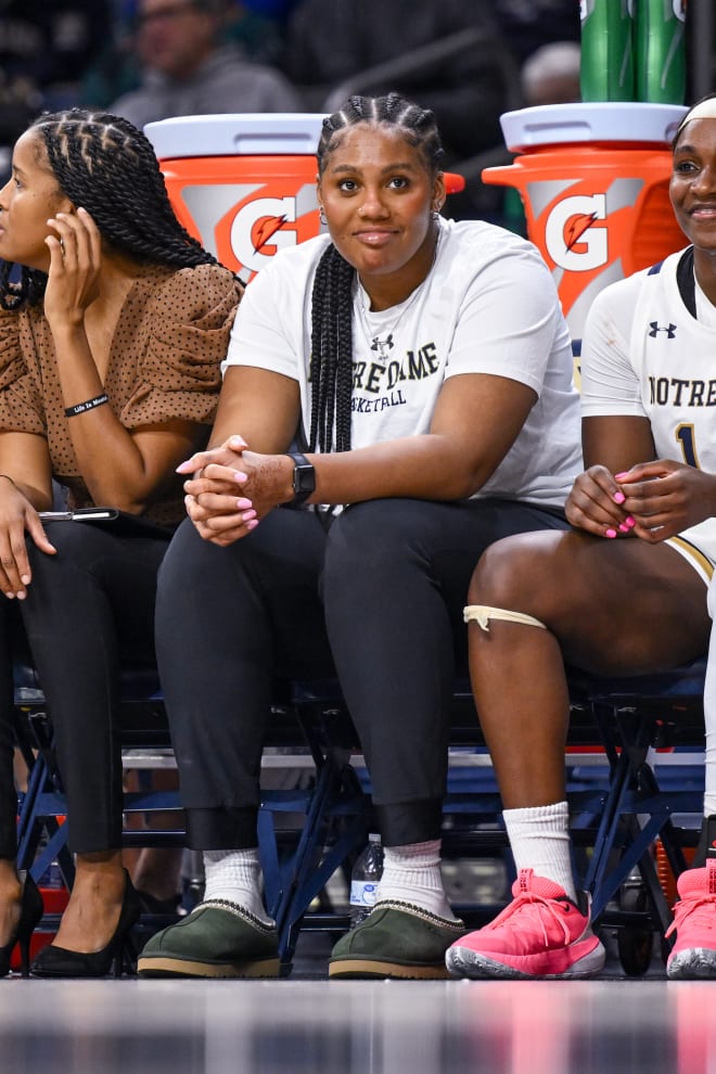 Center Lauren Ebo (middle) missed her fourth straight game for the Irish with a lower leg injury.