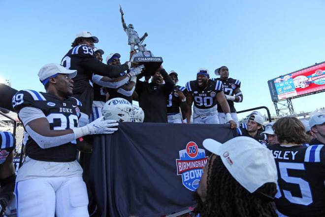 Duke players celebrate after winning the Birmingham Bowl on Saturday. 