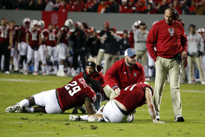 On one play Saturday, three players were injured, including sophomore defensive tackle Alim McNeill (29) and redshirt freshman linebacker Payton Wilson.