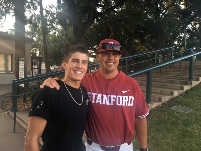 Brock Jones and Stanford pitching coach Thomas Eager.