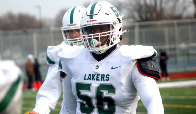 In-state offensive lineman Amir Herring holds Michigan Wolverines football recruiting offer. 