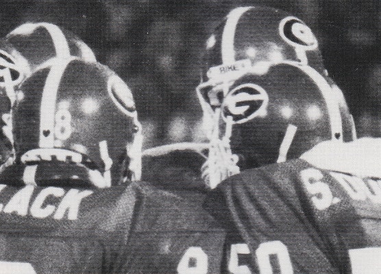 Pictured are the Bulldogs opening the 1982 season versus Clemson featuring a black heart on the back of their helmets. In memory of Phil Gray, the heart decal was displayed for the entire campaign.