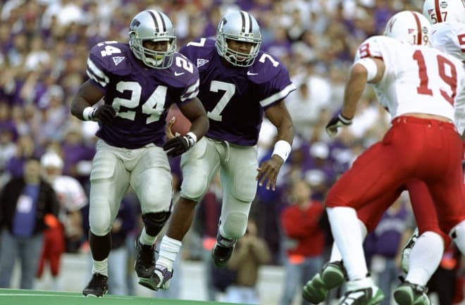 It's Michael Bishop carrying the football against Nebraska with Eric Hickson - current K-State assistant coach Eric Hickson - leading the way.