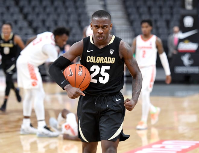 McKinley Wright IV poses after CU defeated Clemson last year at the T-Mobile Arena