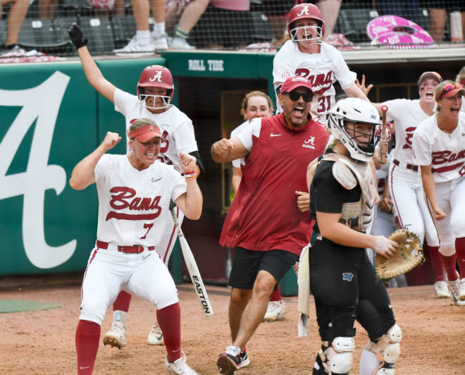 Alabama players rush from the dugout after Alabama batter Ally Shipman (34) connected for a solo homer to give the Tide a 1-0 lead in the top of the seventh. Alabama downed MTSU on the force of shutout pitching by Alabama pitcher Jaala Torrence (21) and a solo homer in the seventh by Alabama batter Ally Shipman (34). Photo | Gary Cosby Jr.-Tuscaloosa News / USA TODAY NETWORK