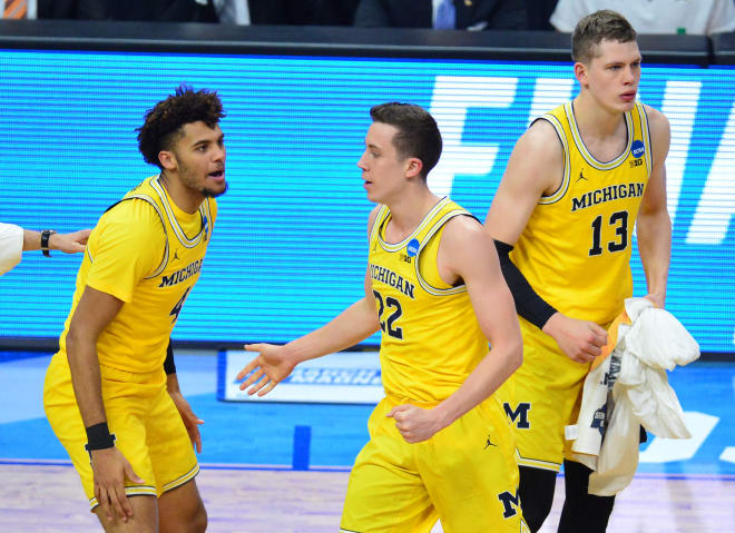 Michigan Wolverines basketball's Isaiah Livers with Duncan Robinson in 2018.