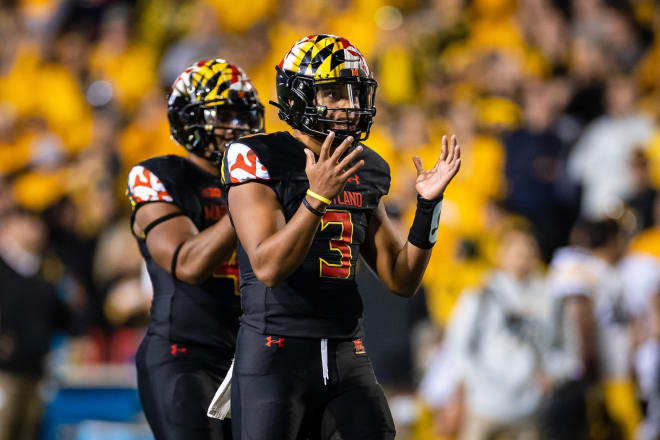 Taulia Tagovailoa (No. 3) threw five interceptions in the Terps' loss to Iowa. 