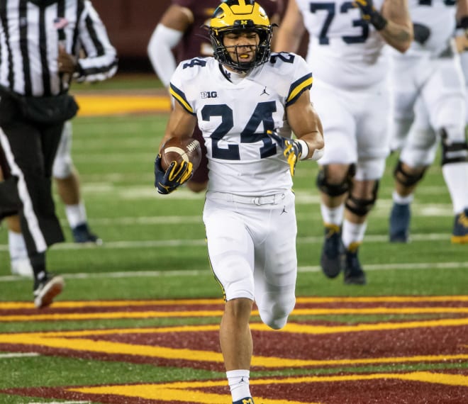 Michigan Wolverines football running back Zach Charbonnet scored on a 70-yard touchdown to tie the game  at 7 early.
