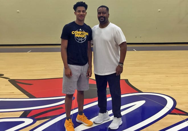 Isaiah Hill during his official visit to Tulsa in August, with TU head coach Frank Haith.