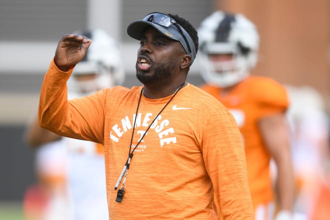 Defensive coordinator Tim Banks coaches players during a drill during Tennessee Football s first fall practice, Wednesday, Aug. 2, 2023.