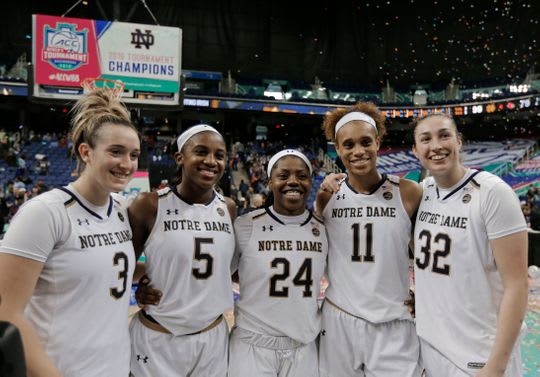 Starters, from left to right, Marina Mabrey, Jackie Young, Arike Ogunbowale, Brianna Turner and Jessica Shepard bask in winning the ACC Championship.