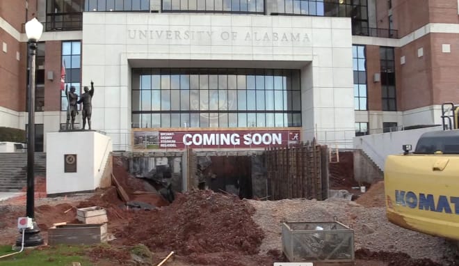 A coming soon sign hangs at the top of where the new player and coaches tunnel will be | BamaInsider.com 