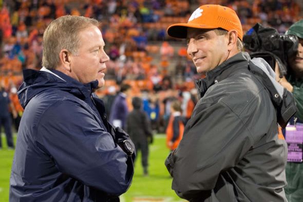 Notre Dame head coach Brian Kelly with Clemson head coach Dabo Swinney