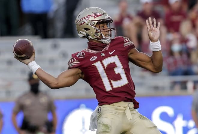 Jordan Travis delivers a pass Saturday against Jacksonville State.